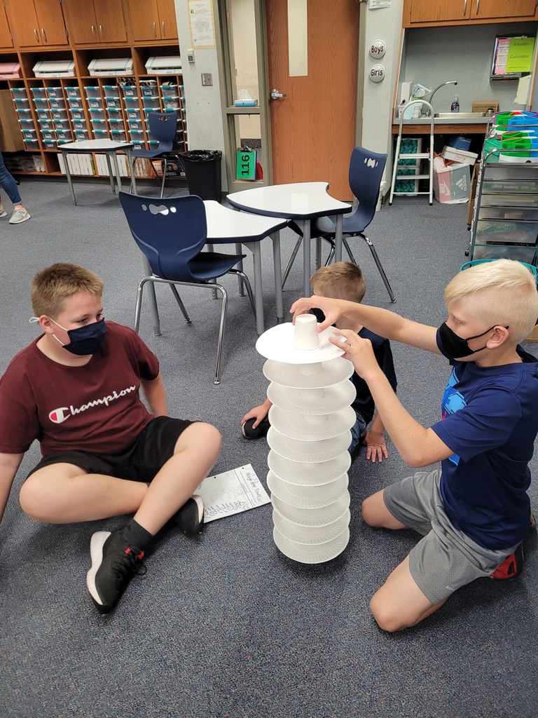 students building tower
