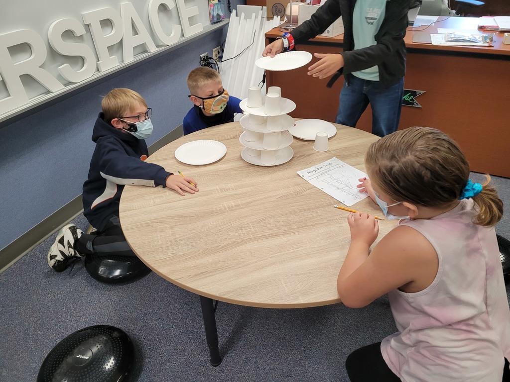 students building tower