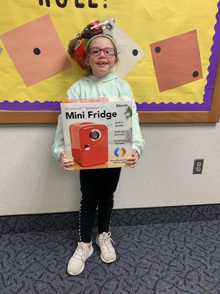 Another student winner of the cash stuffed mini fridge as part of the Step It Up Fundraiser