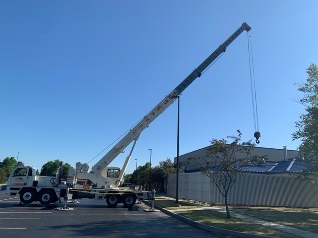 Using a crane at Riddle to remove our old chiller