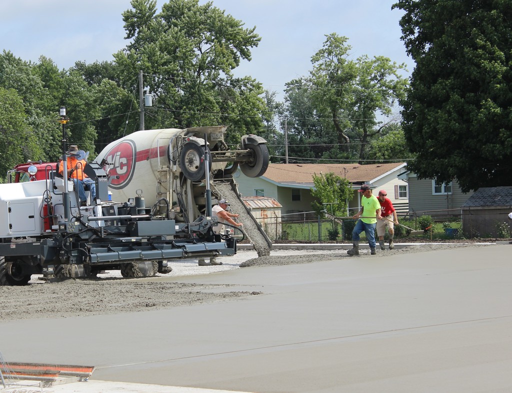 pouring concrete on sports lot