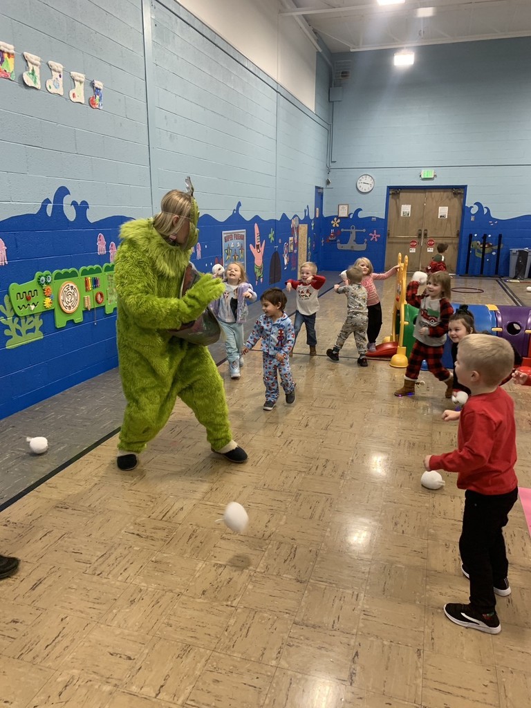 Grinch visits Franklin and has a snowball fight with students