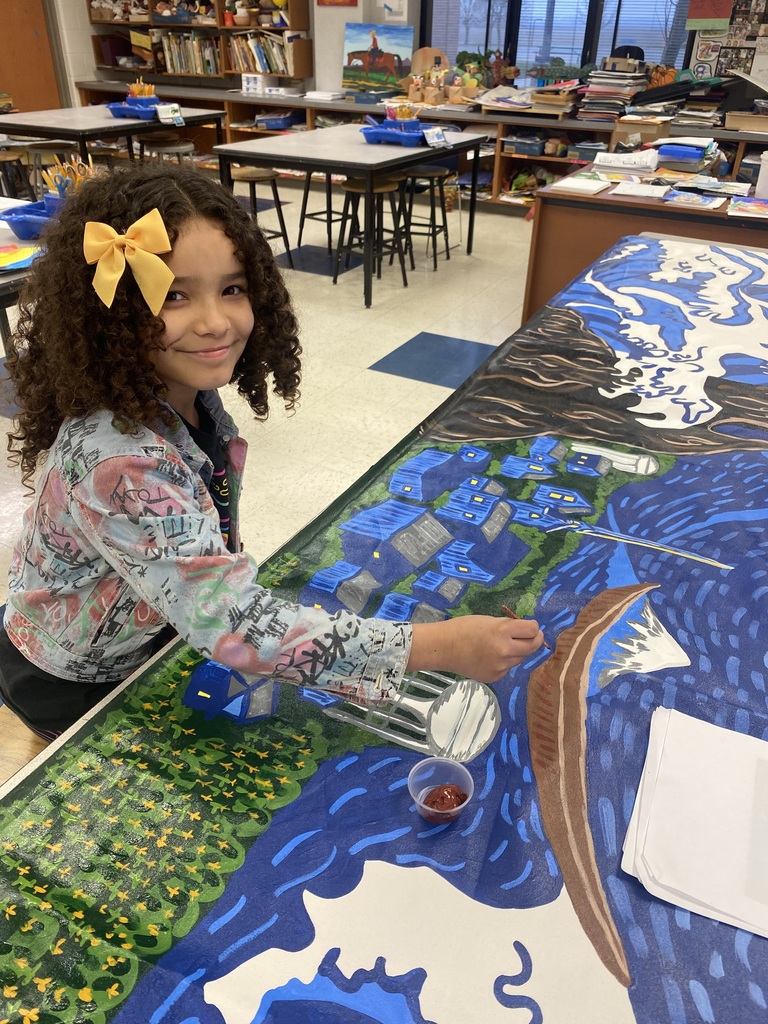 RES student working on a mural
